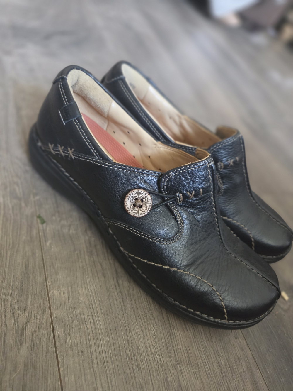 Black Leather Slip-On Shoes with Decorative Button